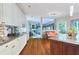 Open-concept kitchen with granite countertops, island, and easy access to the dining and living spaces, ideal for entertaining at 190 Winford Close, Duluth, GA 30097