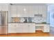 Kitchen with stainless steel appliances, ample counter space, and white cabinets, perfect for any home chef at 190 Winford Close, Duluth, GA 30097