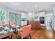Stylish kitchen featuring a center island, modern appliances, and comfortable seating, ideal for relaxing and dining at 190 Winford Close, Duluth, GA 30097