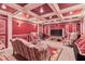 Cozy living room with coffered ceiling, recessed lighting, and floral furniture at 190 Winford Close, Duluth, GA 30097