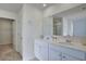 Bathroom featuring double sinks, neutral colors, and plenty of natural light at 2710 Serena Way, South Fulton, GA 30331