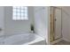 Relaxing bathroom with a garden tub and separate glass shower at 2710 Serena Way, South Fulton, GA 30331