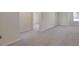 Cozy bedroom with neutral carpeting and a bright window with natural light at 2710 Serena Way, South Fulton, GA 30331
