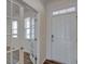 Welcoming entryway with French doors that open to a naturally lit office space at 2710 Serena Way, South Fulton, GA 30331