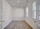 Well-lit home office with wood floors, and bright windows, perfect for remote work at 2710 Serena Way, South Fulton, GA 30331