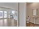 This open layout shows the powder room with the sink and toilet, accented by a decorative mirror at 2710 Serena Way, South Fulton, GA 30331