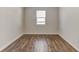 Clean room with wood floors and a window providing natural light at 2710 Serena Way, South Fulton, GA 30331