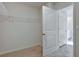 A bright walk-in closet with shelving for organized storage at 2710 Serena Way, South Fulton, GA 30331