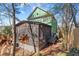 Backyard view of the house with a screened in porch at 1265 Emerald Se Ave, Atlanta, GA 30316