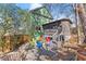 Cozy backyard with colorful Adirondack chairs, and a screened porch at 1265 Emerald Se Ave, Atlanta, GA 30316