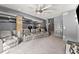 Finished basement with a media center including reclining seats and stairs to upper floor at 1265 Emerald Se Ave, Atlanta, GA 30316