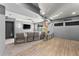Finished basement with a media center, an overhead fan, and an exit to garage at 1265 Emerald Se Ave, Atlanta, GA 30316