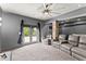 Basement with a media center including reclining seats and an overhead fan at 1265 Emerald Se Ave, Atlanta, GA 30316