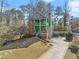 Two story home with well-manicured lawn and mature trees at 1265 Emerald Se Ave, Atlanta, GA 30316