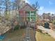 Charming two-story home with a green exterior and a well-maintained front yard at 1265 Emerald Se Ave, Atlanta, GA 30316
