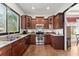 Well-equipped kitchen featuring stainless steel appliances, granite countertops, and ample cabinet space at 1265 Emerald Se Ave, Atlanta, GA 30316