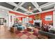 Open concept living space with hardwood floors, fireplace, and natural light at 1265 Emerald Se Ave, Atlanta, GA 30316
