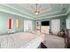 Bright main bedroom featuring neutral walls, tray ceilings, and ample natural light at 1265 Emerald Se Ave, Atlanta, GA 30316