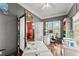 Bright office with large window, white desk, hardwood floors, and neutral wall paint at 1265 Emerald Se Ave, Atlanta, GA 30316