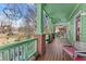 Covered porch with brick columns and wooden flooring perfect for relaxing outdoors at 1265 Emerald Se Ave, Atlanta, GA 30316