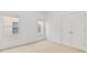 Bright bedroom with natural light, carpet flooring and double closet at 1536 Baxley Pine Trce, Suwanee, GA 30024