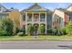 Charming two-story home features a brick facade, covered porch, and well-maintained landscaping at 1536 Baxley Pine Trce, Suwanee, GA 30024