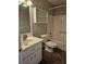 Standard bathroom with a tub and shower combination and tiled floors at 1580 Turner Rd, Cumming, GA 30041