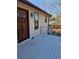 Close-up showcasing a beautiful wooden front door and white deck, accentuating the house's curb appeal at 1580 Turner Rd, Cumming, GA 30041