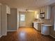 Functional kitchen with white cabinets and laminate countertops, perfect for everyday meal preparation and cooking at 1580 Turner Rd, Cumming, GA 30041