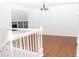 Dining room features hardwood floors, wainscoting, and a modern chandelier at 1630 Versailles Dr, Atlanta, GA 30331