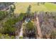 Rural acreage features a modern farmhouse style home and is part wooded and part cleared at 279 Laura Cir, Bowdon, GA 30108