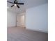 Bedroom with neutral carpeting and a ceiling fan at 279 Laura Cir, Bowdon, GA 30108