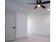Spacious bedroom featuring a ceiling fan and neutral carpeting at 279 Laura Cir, Bowdon, GA 30108