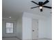 Bright bedroom with a ceiling fan and natural light, providing a welcoming and comfortable atmosphere at 279 Laura Cir, Bowdon, GA 30108
