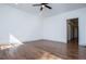 Bright bedroom with white walls, hardwood floors, and a ceiling fan, creating a serene and comfortable space at 279 Laura Cir, Bowdon, GA 30108