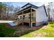 The side of the house shows a well-maintained lawn, providing a serene outdoor space at 279 Laura Cir, Bowdon, GA 30108