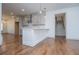 Open-concept kitchen with a kitchen island and stainless steel appliances at 279 Laura Cir, Bowdon, GA 30108
