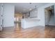 Open concept living area with hardwood floors, stairs to the second floor, and bright, white walls at 279 Laura Cir, Bowdon, GA 30108