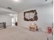 Large bonus room with carpeted floor, play kitchen and plenty of space at 5242 Park Vale Dr, Sugar Hill, GA 30518