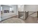 Large bonus room featuring a cozy rug, hardwood floors, and lots of light at 5242 Park Vale Dr, Sugar Hill, GA 30518