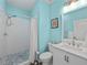 Bathroom featuring shower over tub, sink, and toilet with modern fixtures at 520 Ballyshannon Dr, Dacula, GA 30019