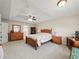 Large bedroom features a ceiling fan, carpet flooring, and generous space at 520 Ballyshannon Dr, Dacula, GA 30019