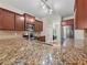 Spacious kitchen featuring granite counters, stainless steel appliances, and ample cabinet space at 520 Ballyshannon Dr, Dacula, GA 30019