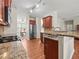 Modern kitchen with granite countertops, stainless steel appliances, and an open layout at 520 Ballyshannon Dr, Dacula, GA 30019