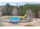 Neighborhood playground featuring swings, slides, and a picnic area at 520 Ballyshannon Dr, Dacula, GA 30019