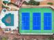 Aerial view of community tennis courts and pool area at 520 Ballyshannon Dr, Dacula, GA 30019