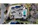 An aerial view of the manicured property featuring an in-ground pool and outdoor living spaces at 2892 Darlington Run, Duluth, GA 30097