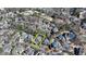 A panoramic aerial view showcases home in a lush neighborhood with a yellow outline of the property lines at 2892 Darlington Run, Duluth, GA 30097