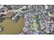 Aerial view of property in a golf community near a lake with a yellow outline of the property lines at 2892 Darlington Run, Duluth, GA 30097