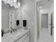 Bathroom featuring a vanity with a sink, mirror, and access to the shower and toilet area at 2892 Darlington Run, Duluth, GA 30097